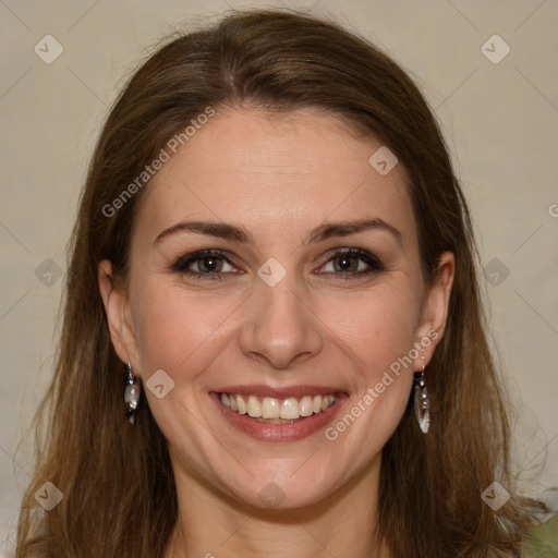 Joyful white young-adult female with long  brown hair and green eyes