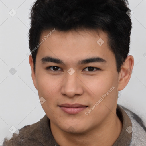 Joyful asian young-adult male with short  brown hair and brown eyes