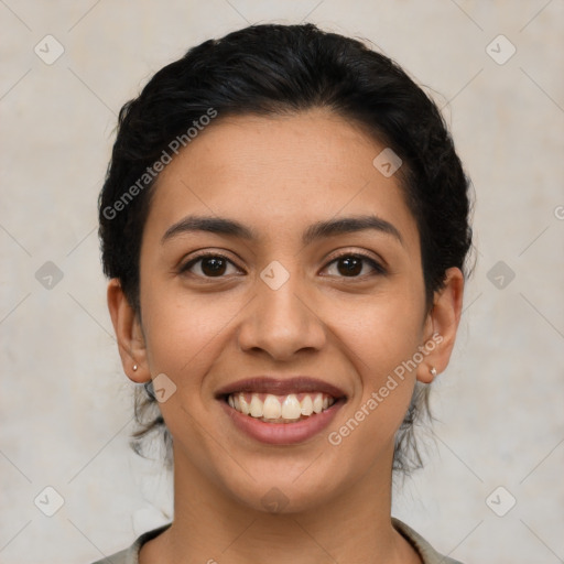 Joyful latino young-adult female with medium  brown hair and brown eyes