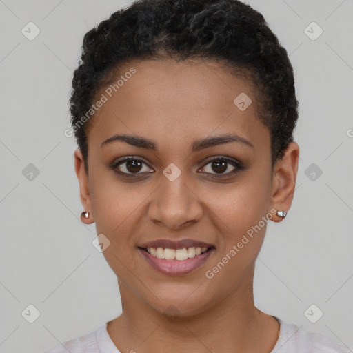 Joyful latino young-adult female with short  black hair and brown eyes