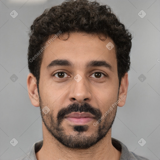 Neutral white young-adult male with short  black hair and brown eyes