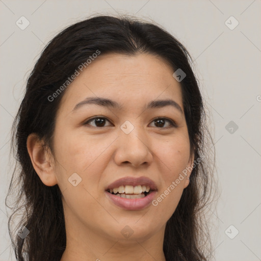 Joyful latino young-adult female with long  brown hair and brown eyes