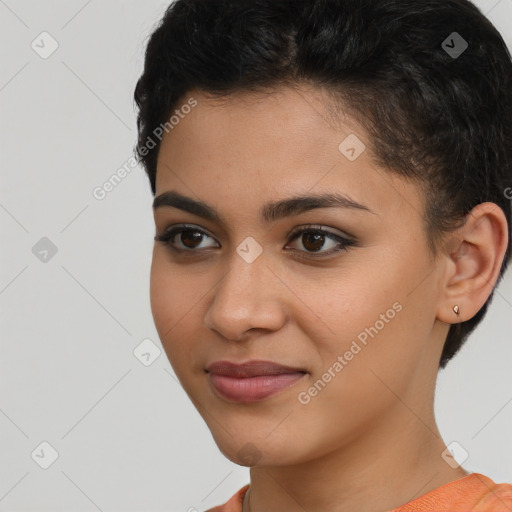 Joyful latino young-adult female with short  brown hair and brown eyes