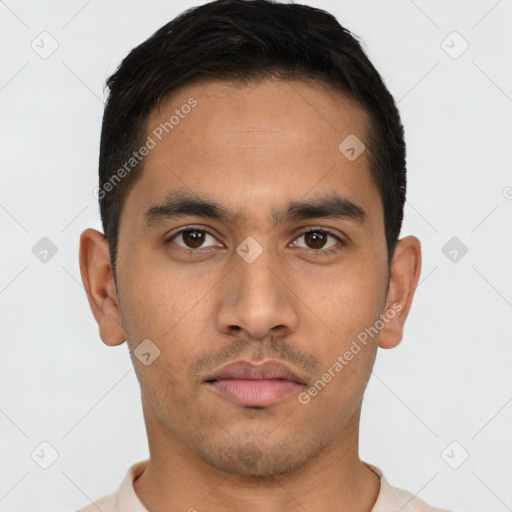 Neutral latino young-adult male with short  brown hair and brown eyes