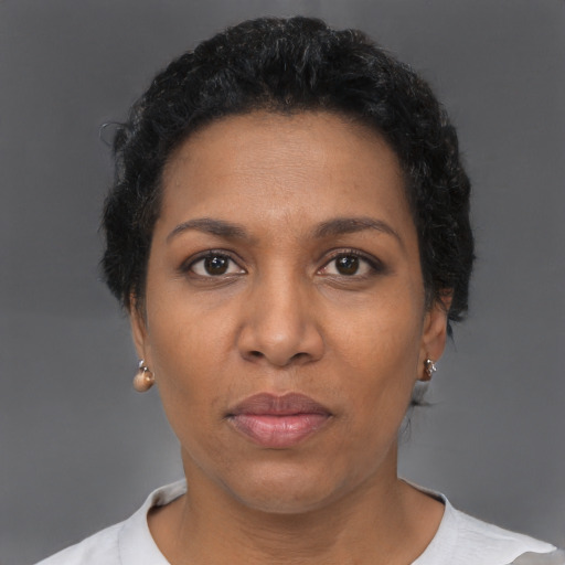 Neutral black young-adult female with short  brown hair and brown eyes
