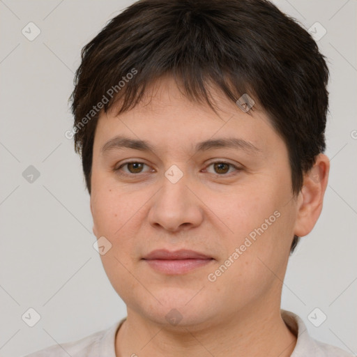 Joyful white young-adult female with short  brown hair and brown eyes