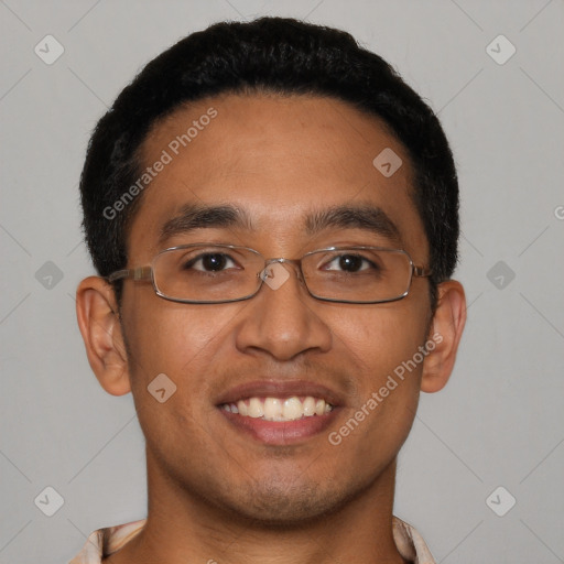 Joyful latino young-adult male with short  black hair and brown eyes