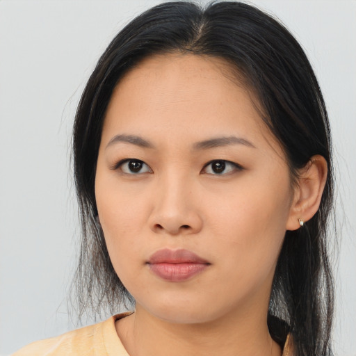 Neutral asian young-adult female with long  brown hair and brown eyes