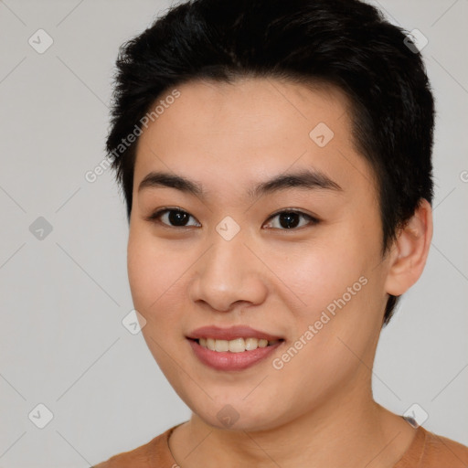 Joyful asian young-adult female with short  black hair and brown eyes