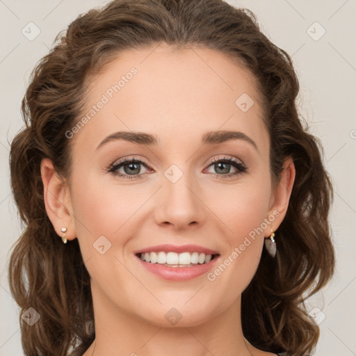 Joyful white young-adult female with long  brown hair and green eyes