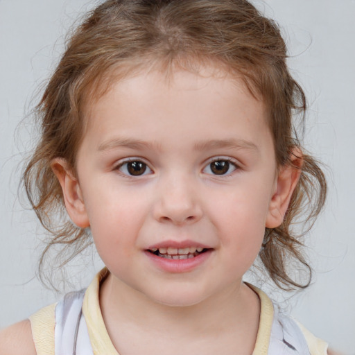 Joyful white child female with medium  brown hair and brown eyes