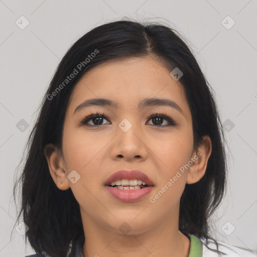 Joyful asian young-adult female with medium  black hair and brown eyes