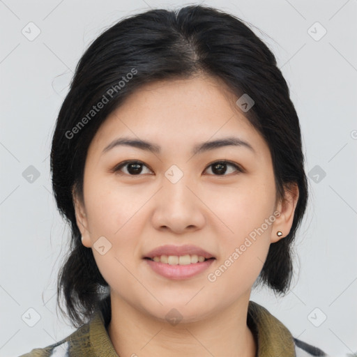 Joyful asian young-adult female with medium  brown hair and brown eyes