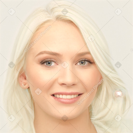 Joyful white young-adult female with long  blond hair and blue eyes