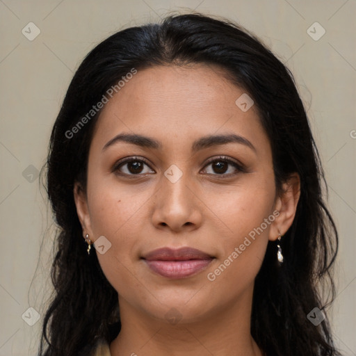 Joyful latino young-adult female with long  brown hair and brown eyes