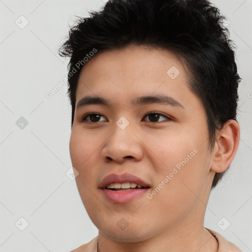 Joyful asian young-adult male with short  brown hair and brown eyes