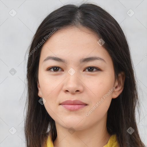 Joyful asian young-adult female with long  brown hair and brown eyes