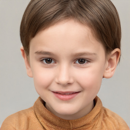 Joyful white child female with short  brown hair and brown eyes