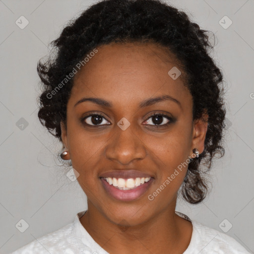 Joyful black young-adult female with medium  black hair and brown eyes