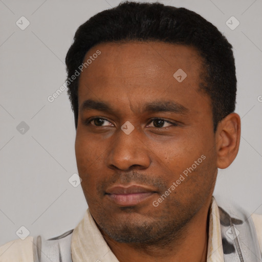 Neutral black young-adult male with short  black hair and brown eyes