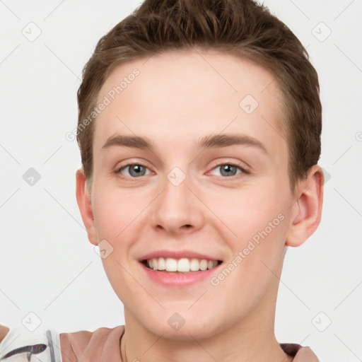 Joyful white young-adult female with short  brown hair and grey eyes