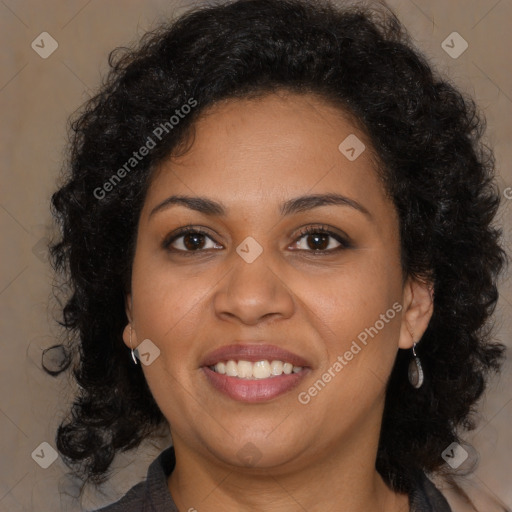 Joyful black young-adult female with long  brown hair and brown eyes