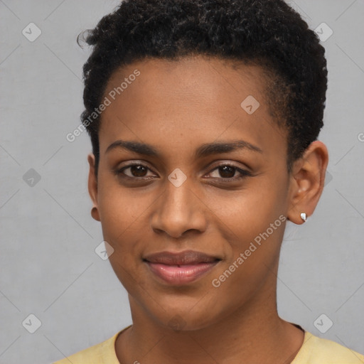 Joyful black young-adult female with short  brown hair and brown eyes