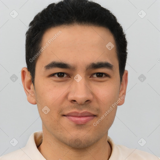 Joyful latino young-adult male with short  brown hair and brown eyes