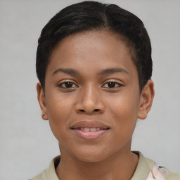 Joyful black young-adult female with short  brown hair and brown eyes