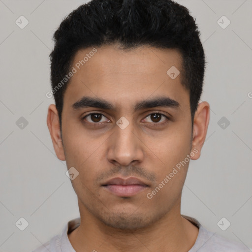 Neutral latino young-adult male with short  black hair and brown eyes