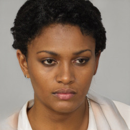 Neutral black young-adult female with short  brown hair and brown eyes