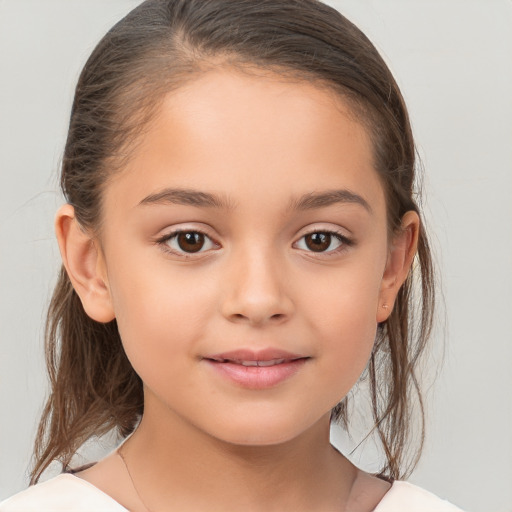 Joyful white child female with medium  brown hair and brown eyes