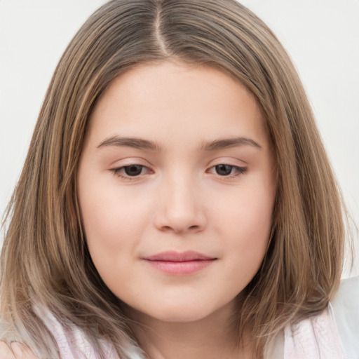 Joyful white child female with long  brown hair and brown eyes