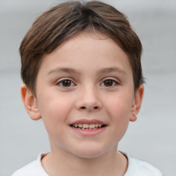 Joyful white child female with short  brown hair and brown eyes