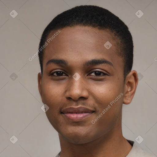 Joyful black young-adult male with short  brown hair and brown eyes