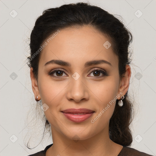 Joyful latino young-adult female with medium  brown hair and brown eyes