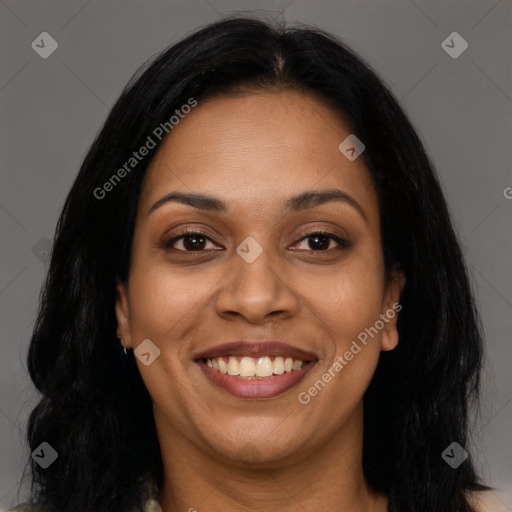 Joyful latino young-adult female with long  brown hair and brown eyes