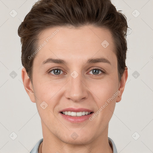 Joyful white young-adult female with short  brown hair and grey eyes