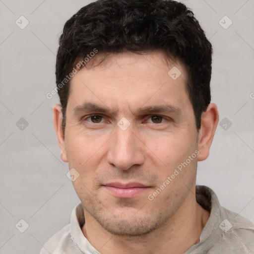 Neutral white adult male with short  brown hair and brown eyes