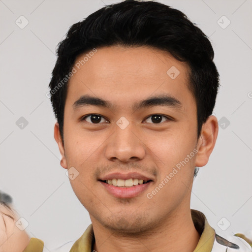 Joyful white young-adult male with short  black hair and brown eyes