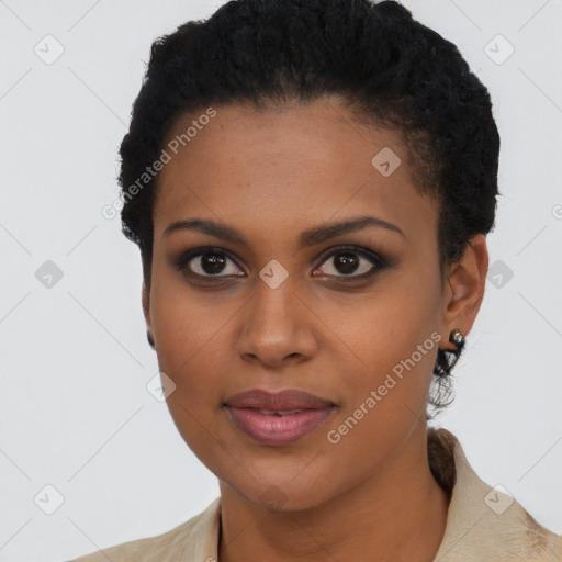 Joyful black young-adult female with short  black hair and brown eyes