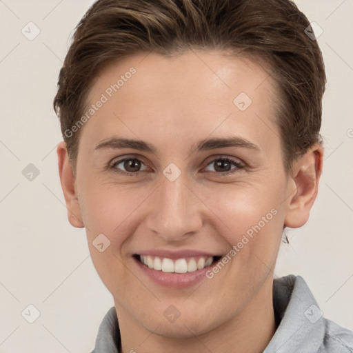 Joyful white young-adult female with short  brown hair and grey eyes