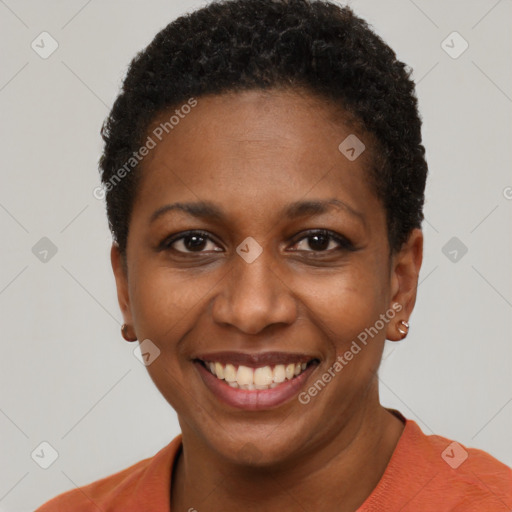 Joyful black young-adult female with short  black hair and brown eyes