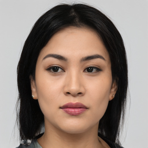Neutral asian young-adult female with medium  black hair and brown eyes