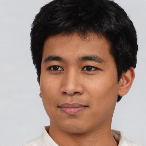 Neutral asian young-adult male with short  black hair and brown eyes