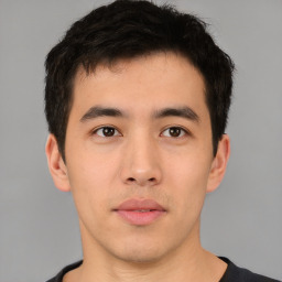 Neutral asian young-adult male with short  brown hair and brown eyes