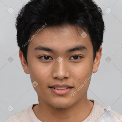 Joyful asian young-adult male with short  black hair and brown eyes