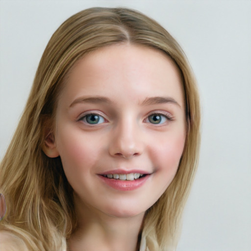 Joyful white child female with long  brown hair and blue eyes