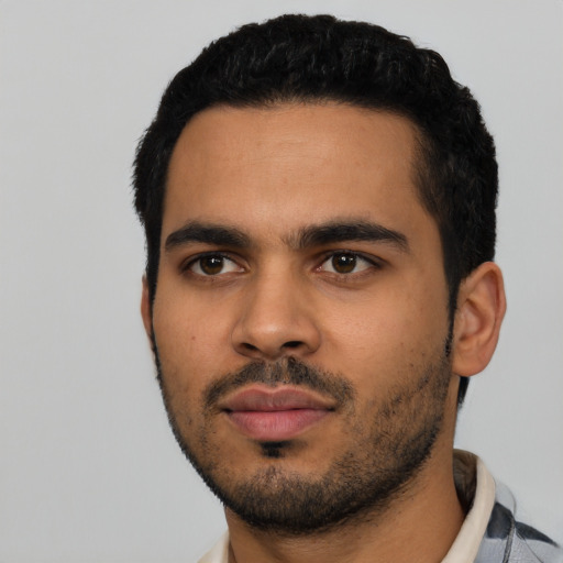 Neutral latino young-adult male with short  black hair and brown eyes