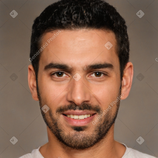 Joyful white young-adult male with short  black hair and brown eyes